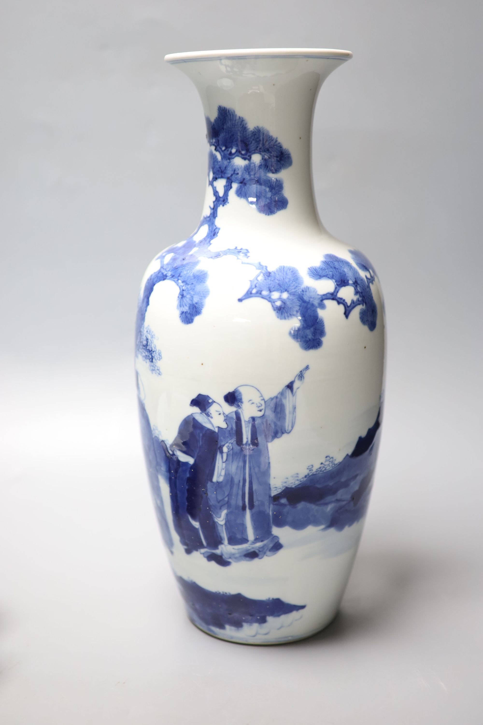 A Chinese blue and white vase, Kangxi mark, c.1900, 36cm and a similar bowl, Qianlong seal mark, early 20th century, 18.5cm